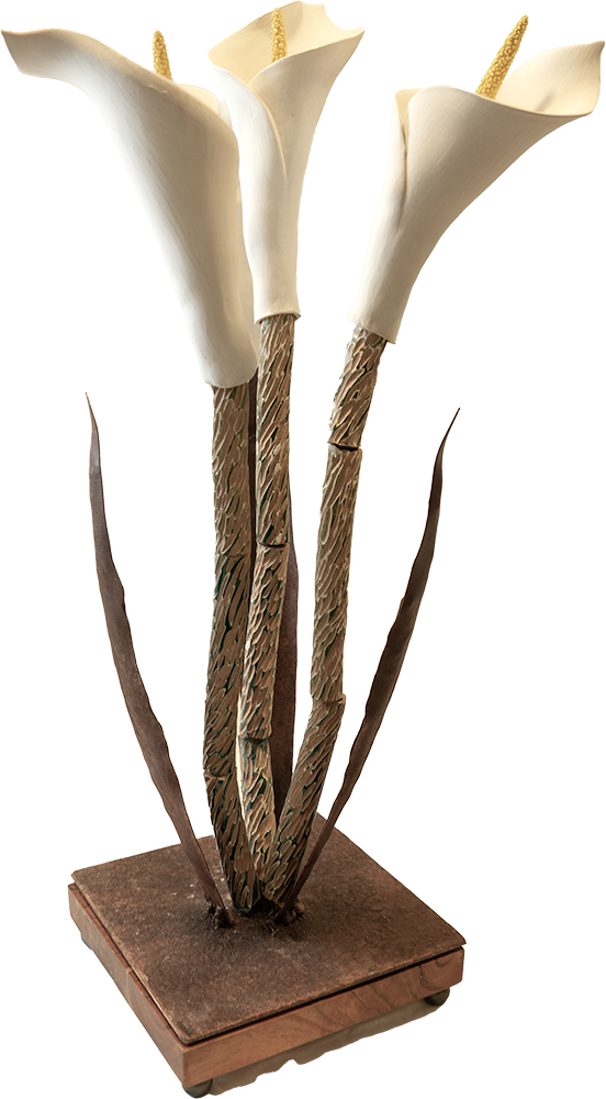 Elegant ceramic sculpture with white calla lily flowers on a wooden base
